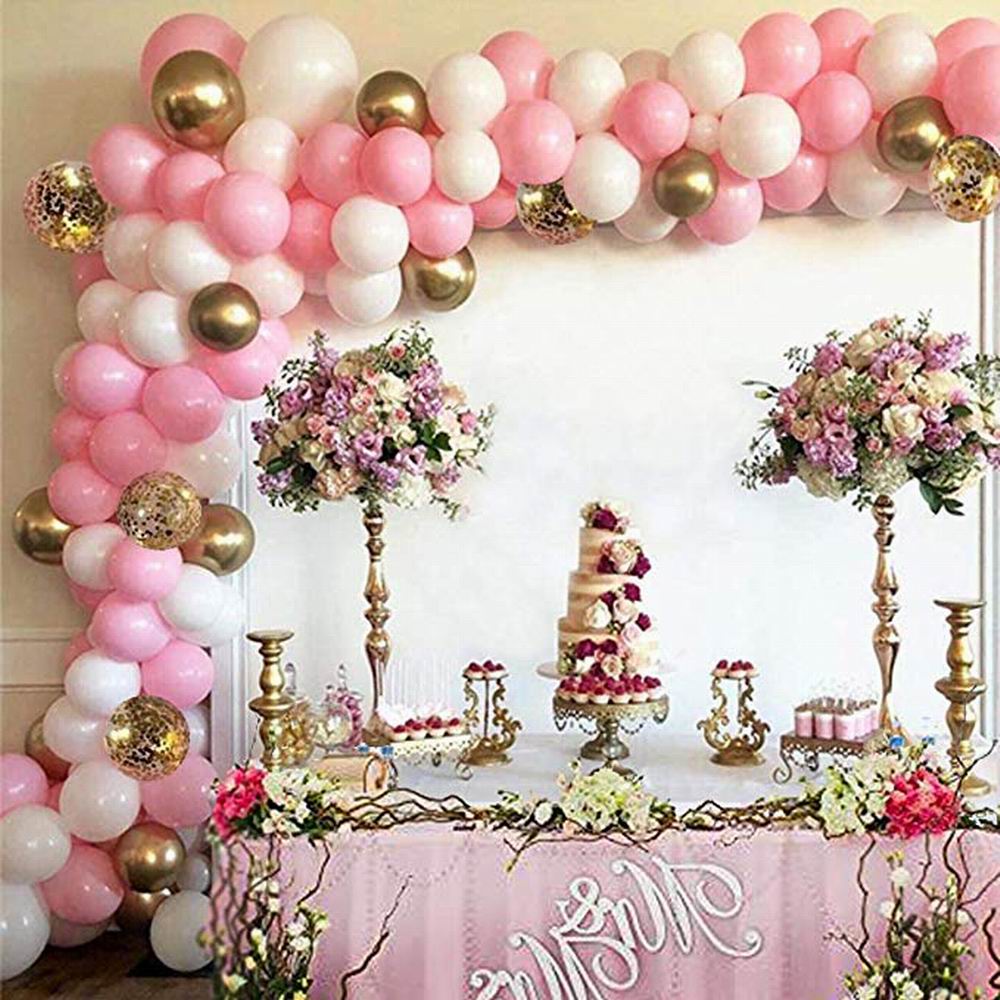 Pink white and gold balloon arch